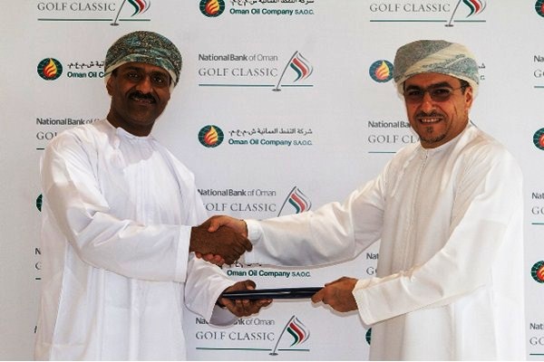 Ahmed Al Musalmi of the National Bank of Oman (left) shakes hands on the new spnsorship agreement with Mulham Al Jarf of the Oman Oil Company