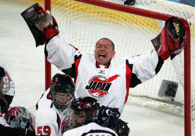 An ecstatic Mitsuru Nagase celebrates getting to the Vancouver 2010 gold-medal match after defeating hosts Canada in the semi-final