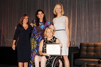 Ann Cody (front centre) is a Paralympic champion