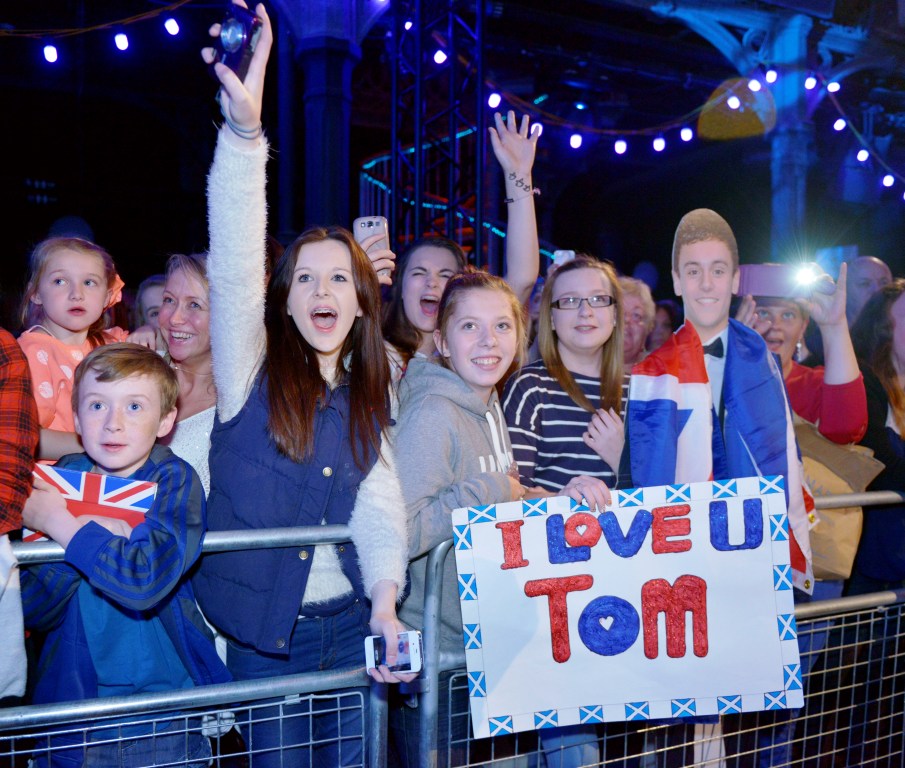 Excited fans in Glasgow waiting to catch a glimpse of Glasgow 2014 Ambassador Tom Daley
