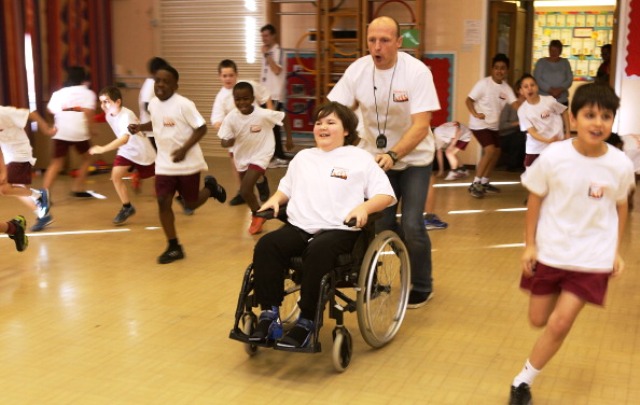 Former England rugby player Matt Dawson visits a school as part of the Sainsbury's Active Kids For All campaign