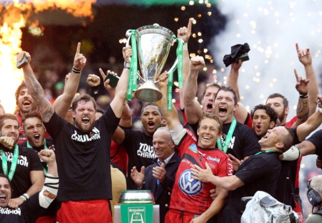 French side Toulon lift the 2013 Heineken Cup trophy following their victory at Dublin's Aviva Stadium
