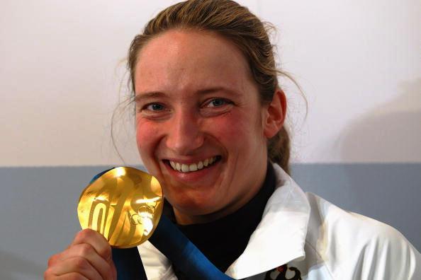 Germany's Olympic luge champion Tatjana Huefner posing with her Vancouver 2010 gold medal