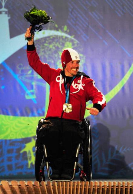 Josh Dueck celebrates his silver medal in the men's sitting slalom at Vancouver 2010