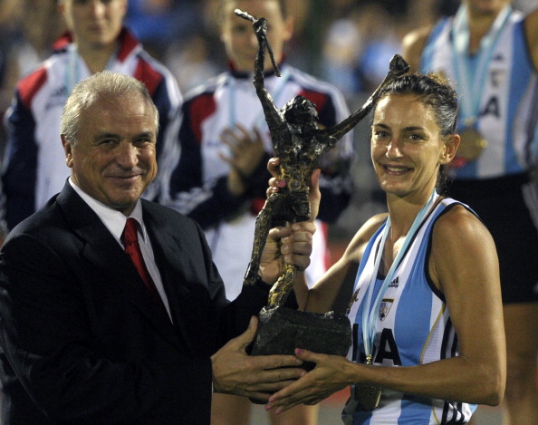 Luciana Aymar and FIH President Leandro Negre after winning the 2012 Champions Trophy on home soil