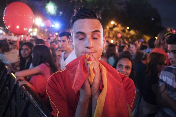 A disappointed spectator in the centre of Madrid reacts to the news that the Spanish capital had been knocked out in the first round of voting to host the 2020 Olympics and Paralympics