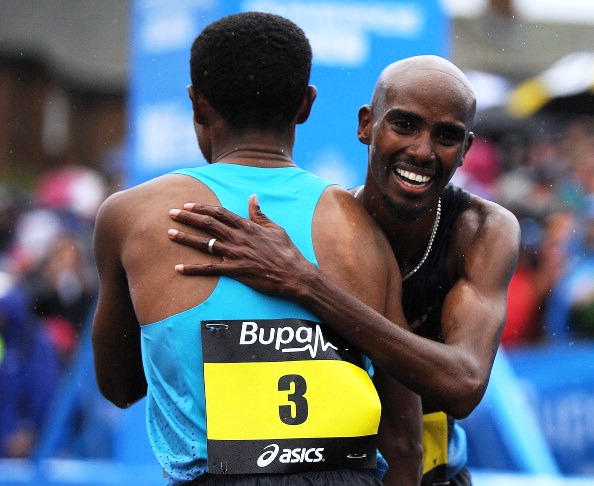 Mo Farah congratulates Kenenisa Bekele after the Ethiopian's win in the Great North Run