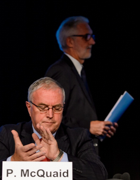 UCI President Pat McQuaid applauds after British rival Brian Cookson has finished delivering his presentation to the European Cycling Union in Zürich-Regensdorf