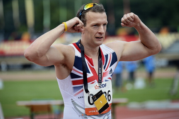 Richard Whitehead pictured after winning his second IPC World Championship T42 200m title at Lyon in July has once again demonstrated his versatilty over much longer distances