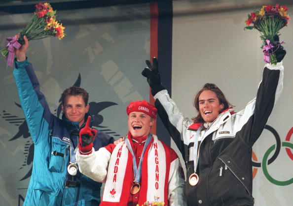 Ross Rebagliati (centre) kept his gold for the first Olympic snowboard event after a whiff of controversy
