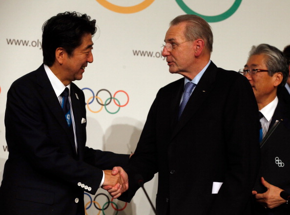 Japanese Prime Minister Shinzo Abe is congratulated by IOC President Jacques Rogge after Tokyo is awarded the 2020 Olympics and Paralympics