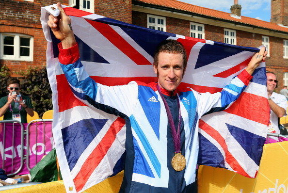 Sir Bradley Wiggins pictured after winning the Olympic time trial on the streets of London is another prominent cycling figure to have crashed on British roads