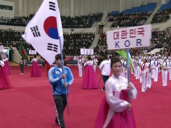North Korea have allowed South Korean athletes to march alongside their flag at a weightlifting event in Pyongyang