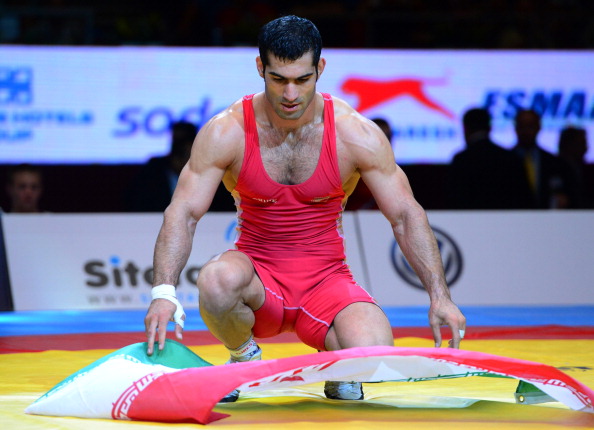 Taleb Nariman Nematpour of Iran celebrates after winning his first world title in the 84kg Greco Roman category
