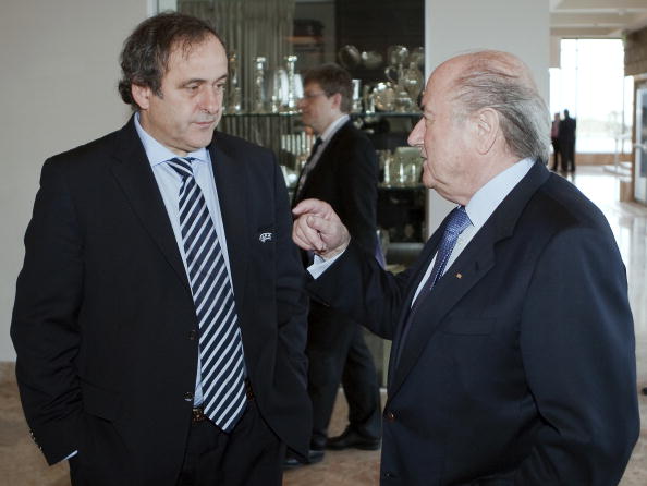 UEFA and FIFA Presidents Michel Platini and Sepp Blatter speaking here in 2010 have differences in opinion over the 2022 World Cup in Qatar