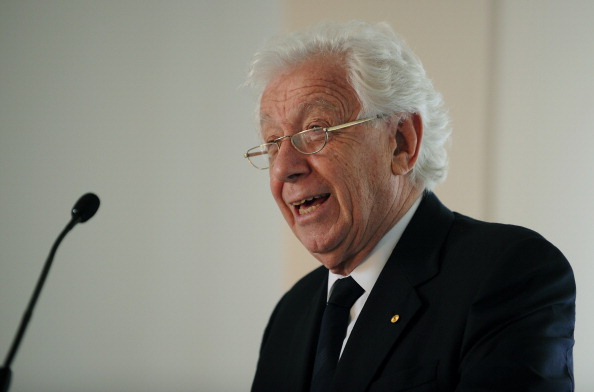 FFA chairman Frank Lowy has warned Sepp Blatter that he could 'make a bad situation worse' by switching the 2022 FIFA World Cup to the northern hemisphere winter