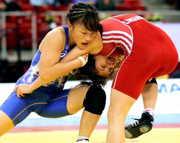 Eri Tosaka (blue) went one better than last year to win gold at the 2013 FILA World Championships
