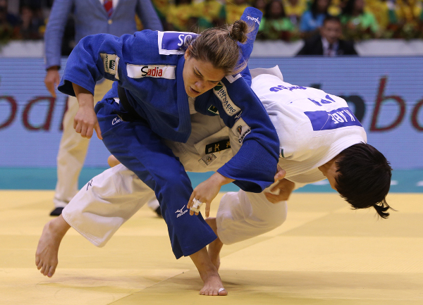 Japan beat the hosts Brazil to defend their women's judo team title at the World Championships