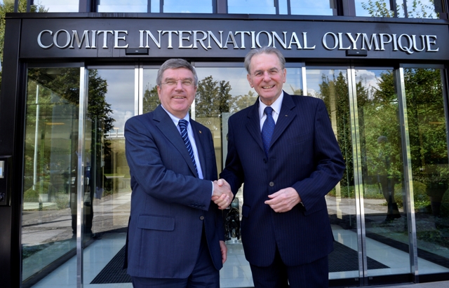 New IOC President Thomas Bach meets predecessor Jacques Rogge outside the organisation's headquarters in Lausanne
