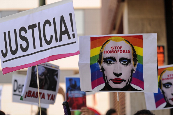 Protests, such as this one in Madrid, have taken place in multiple cities across the globe in response to Russia's anti-gay law