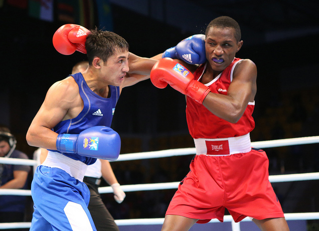 American lightweight Kenneth Sims Jr red went toe to toe with 2012 Olympian Fazliddin Gaibnazarov of Uzbekistan