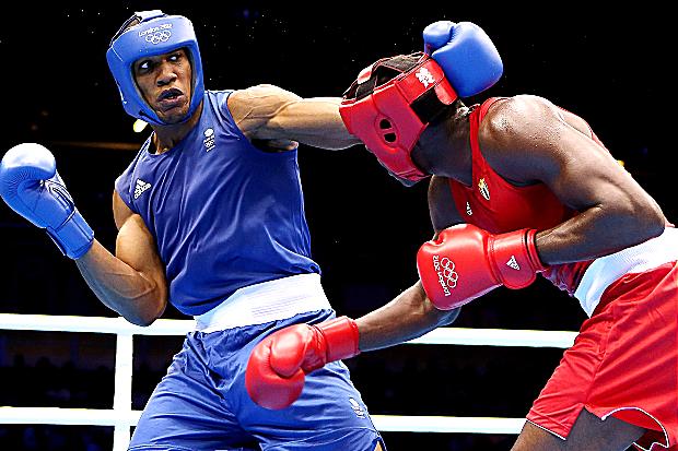 Britain's Anthony Joshua, the London 2012 super-heavyweight gold medallist, is making his professional debut on Saturday but claims he is not motivated by money
