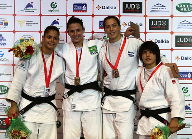Barbara Timo (second from left) made it three gold medals on the day for Brazil
