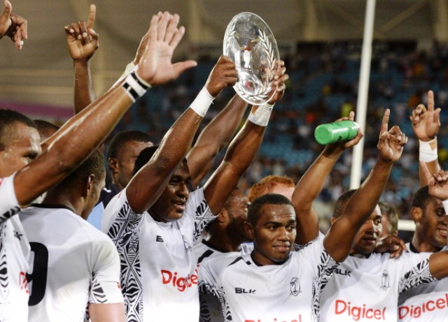 Ben Ryan's Fijian side celebrate their Plate victory on the Gold Coast