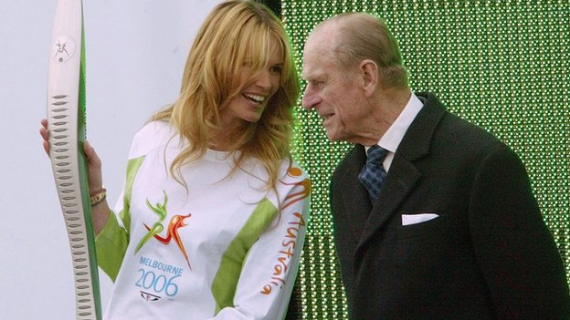 Australian supermodel Elle McPherson jokes with Prince Philiip at the start of the Queen's Baton Relay for Melbourne 2006