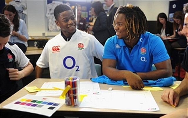 England winger Marlon Yarde meets with pupils from the Bruntcliffe School in Leeds at the official launch of England's new home kit