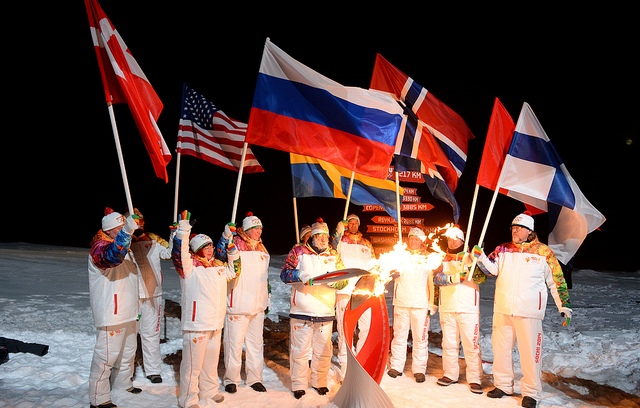 Explorer Artur Chilingarov lights the Flame at the North Pole