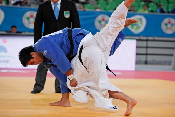 France's Vincent Manquest (blue) led France to their first gold of the Judo World Junior Championships in Ljubljana