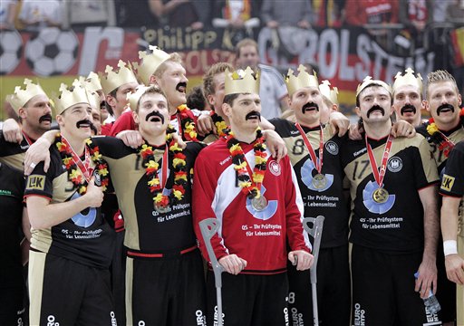 Germany celebrate winning the World Handball Championships in 2007, the last occasion they were hosted in the country