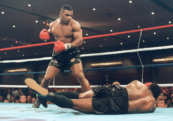 Iron Mike Tyson knocks out Trever Berbick in 1986 to become the youngest ever World Heavyweight champion