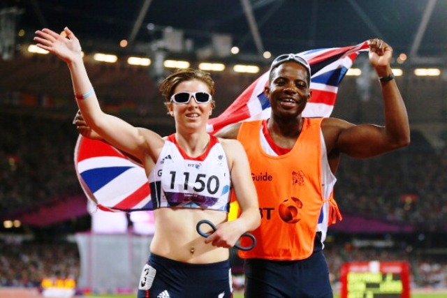 Libby Clegg and her guide Mikail Huggins celebrate Paralympic silver in London last year