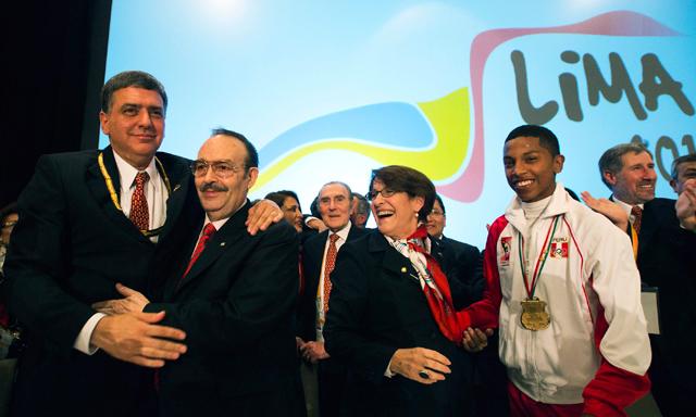 Peruvian officials, including National Olympic Committee President José Quiñones (left) and Mayor  Susana Villarán, celebrate with PASO head Mario Vázquez Raña after being awarded the 2019 Pan American and Parapan Games
