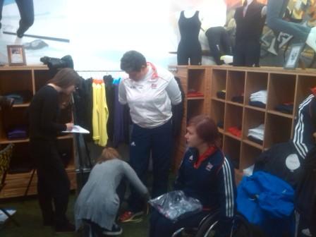 Medal winning members of the British para-canoe team are measured up for their new kit