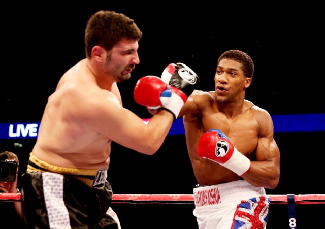 Olympic champion Anthony Joshua looked impressive on his professional debut against Italian Emanuele Leo in London