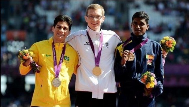 Pradeep Sanjaya (far right) won Sri Lanka's first-ever medal in the Paralympics when he finished third in the T46 400m at London 2012