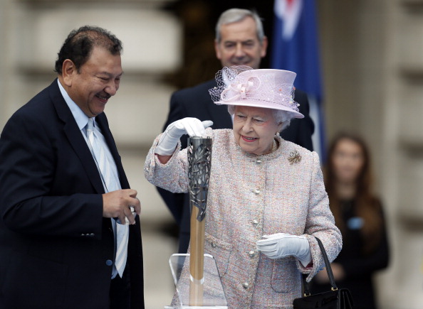 Prince Imran alongside the Queen as she got the Baton Relay underway in the forecourt of Buckingham Palace