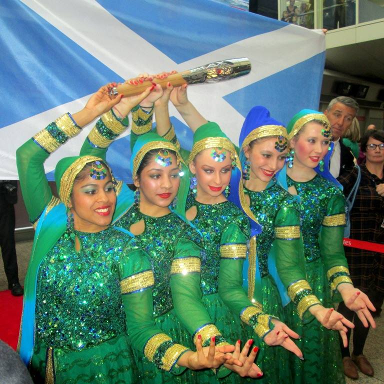 There was a touch of Bollywood glamour as the Queen's Baton left Glasgow Airport for New Delhi