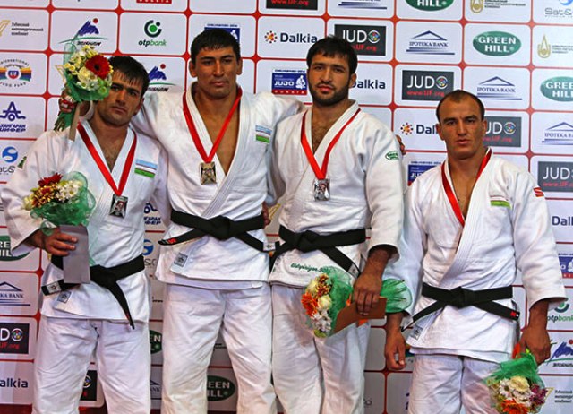 Sherali Juraev (second from left) sent the home crowd home happy for the second day in-a-row with victory in the under 90kg class