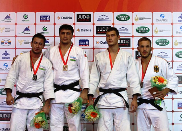 Soyib Kurbanov (second from left) ensured a gold medal winning end to the Tashkent Grand Prix for hosts Uzbekistan