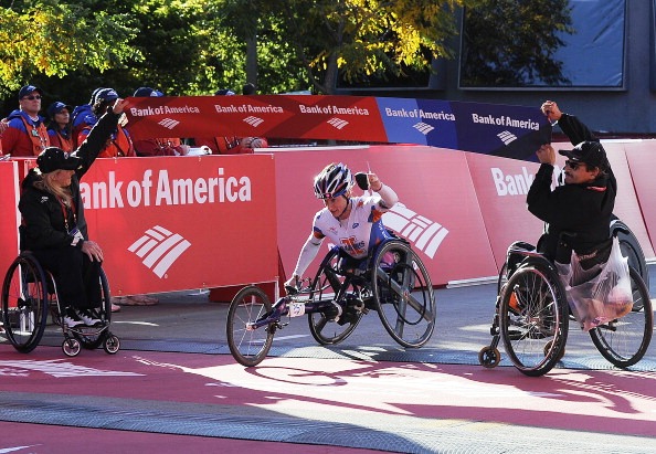 Tatyana McFadden crosses the line in Chicago for her third major marathon win of the year