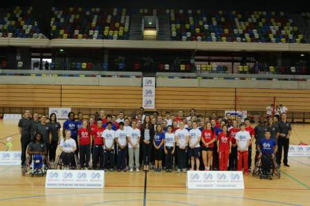 The Duchess of Cambridge poses with athletes young and old in addition to coaches and support staff in the Copper Box