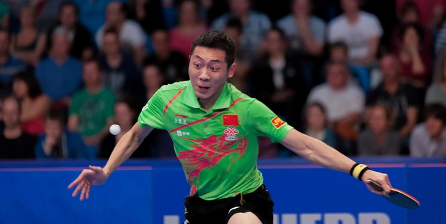The win gave Xu Xin his first men's singles title at major championships