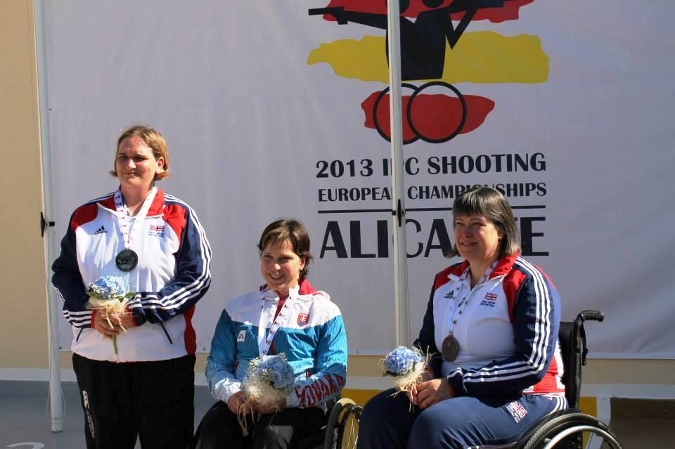 Veronika Vadovicova (centre) celebrates her second indivdual gold medal at the 2013 IPC Shooting European Championships