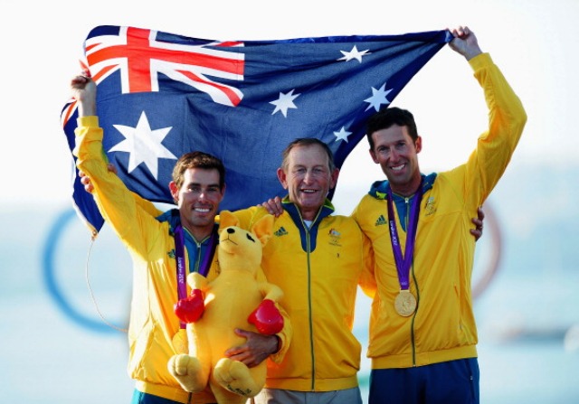 Victor Kovalenko (centre) celebrates London 2012 gold with Matthew Belcher (left) and Malcolm Page