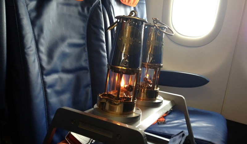 There was a special seat for the Olympic Flame on Aeroflot flight SU 7101 which brought it from Athens to Moscow