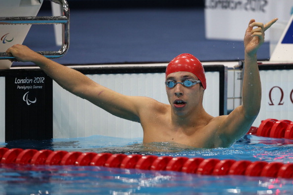 London 2012 gold medallist Jonathan Fox broke the first world record of the Championships in the S7 100m backstroke